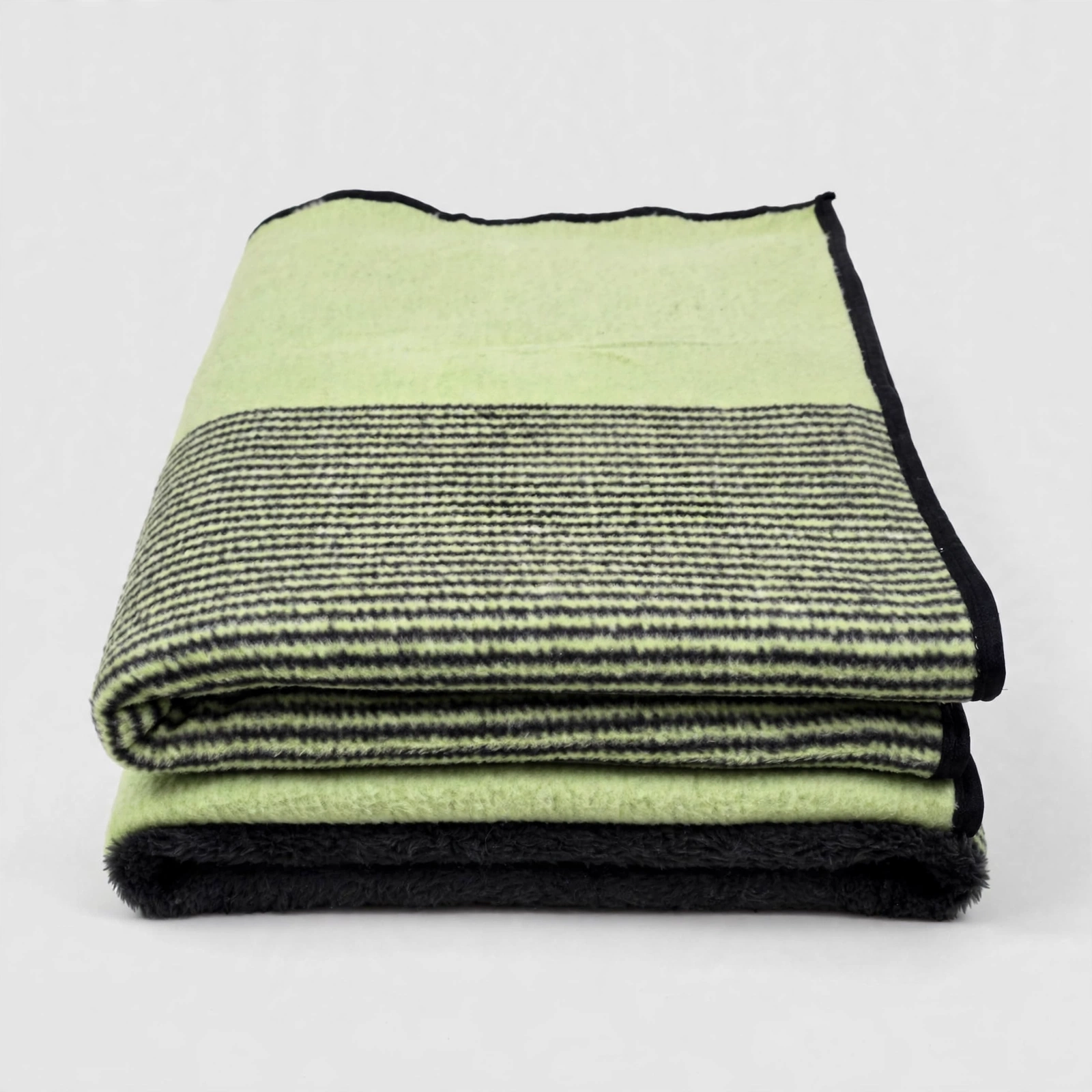 Couverture polaire double face vert pistache et noir