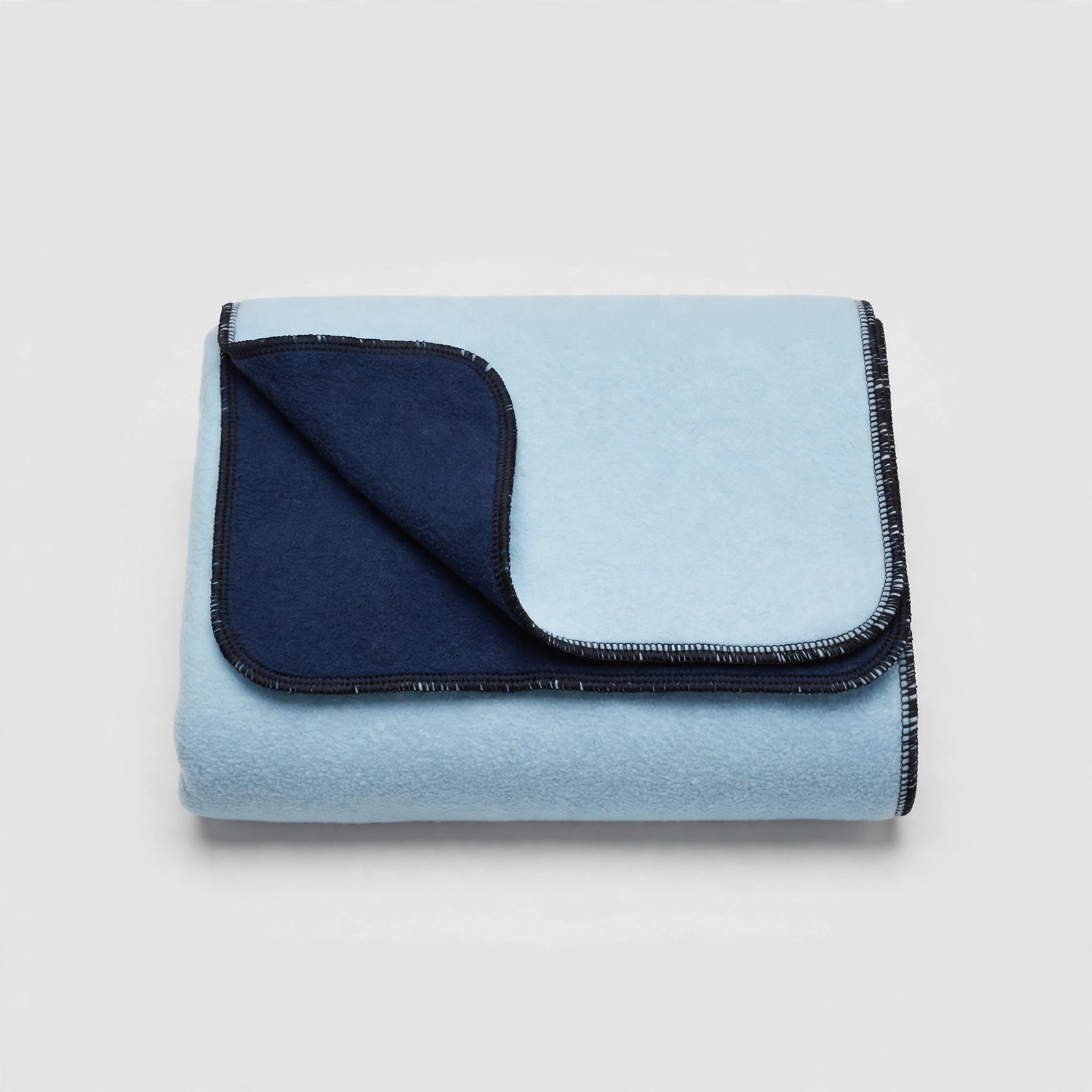 Couverture polaire double face unie bleu ciel et bleu marine